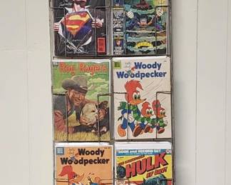 RARE 1950 DELL COMIC BOOK WALL RACK WITH COMICS. WILL BE SOLD WITH COMICS.