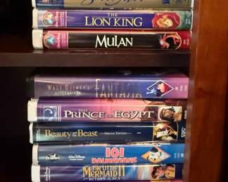 Disney VHSs, including: Bambi, Aladdin, Cinderella, Mulan