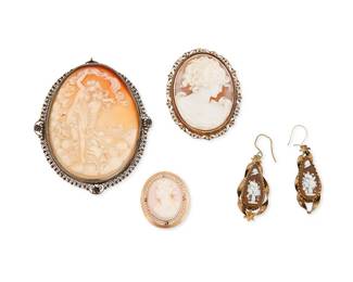 1063
A Group of Cameo Jewelry
Featuring three gold filled, silver and shell cameo brooches together with a pair of gold filled and glass cameo earrings
5 pieces
Brooches: 1 1/4 - 3 1/2 in.
55.0 grams gross
Estimate: $200 - $400