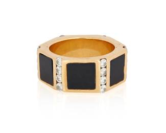 1030
An 18K Gold and Onyx Ring
Featuring six onyx tablets accented by twenty-four round diamonds weighing approximately 0.48 carat
Size: 5
11.8 grams gross
Estimate: $400 - $600