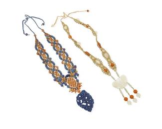 1100
Barbara Natoli Witt: Two Cavandoli Macramé and Hardstone Necklaces
Each signed and dated to ceramic bead
Two works:
An ornate knotted pendant necklace in beige and orange with amber and jade beads suspending a carved jade butterfly pendant with bead dangles, circa 1975
40 1/2 in x 4 in.
A knotted necklace in blue and orange with lapis lazuli, jade, and 14k gold beads suspending a large carved lapis lazuli dragon pendant, circa 1977
36 in. x 3 1/2 in.
2 pieces total
175.0 grams gross
Estimate: $700 - $900