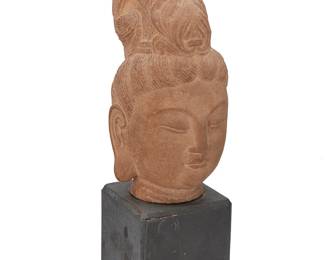 1167
20th century
A Chinese carved stone head of Guanyin
The head mounted to a painted wood base
Stone: 15.5" H x 7.5" W x 8" D; Base: 6.75" H x 7" W x 6.75" D
Estimate: $200 - $400