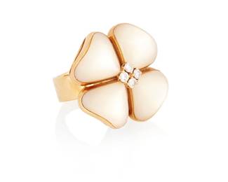 1006
Gucci: An 18K Gold and Mother-of-Pearl Ring
Of a clover design featuring mother-of-pearl inlay centering four round diamonds, signed Gucci
Size: 3 1/2
12.0 grams gross
Estimate: $800 - $1,200
