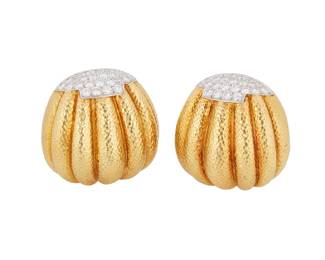 1004
David Webb: A Pair of 18K Gold, Platinum and Diamond Earrings
Of a scalloped design finished with round diamonds weighing approximately 2.15 carats, signed Webb
2 pieces
Measures: 1 1/8 x 1 1/2 in.
44.4 grams gross
Estimate: $2,500 - $3,500