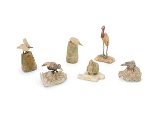 1138
20th century
A group of lapidary bird figures
The carved stone figures with metal legs and feet, comprising a serpentine pelican figure with rose quartz beak on a quartz base, an onyx eagle figure on a quartz base, a white hardstone cockatoo figure on a serpentine base, a red jasper and onyx flamingo figure on an onyx base, another onyx bird on a pyrite base, and another quartz bird figure on a serpentine base, 6 pieces
Tallest: 3.75" H x 1.875" W x 1.625" D; Smallest: 2" H x 1.875" W x 2.125" D
Estimate: $200 - $400