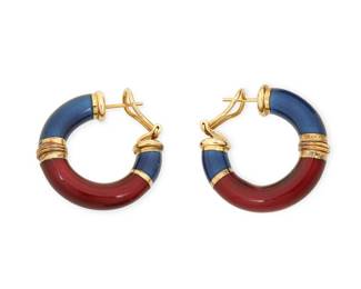 1050
A Pair of Gold and Enamel Earrings
together with a pair of Italian 18k gold and red and blue enamel hoop earrings
Measures: 1 1/2 in.
17.3 grams gross
Estimate: $600 - $800