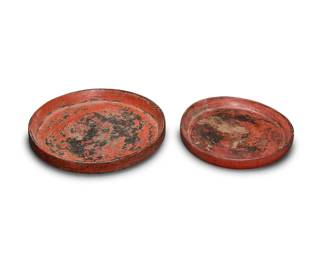 1175
Late 19th/early 20th century
Two Burmese red lacquerware trays
Comprising two carved wood trays in graduated sizes, 2 pieces
Larger: 3" H x 21.75" Dia. approx.; Smaller: 2.75" H x 18.75" Dia. approx.
Estimate: $200 - $400