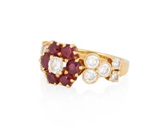 1028
A Gold, Garnet and Diamond Ring
Of a floral design featuring round garnets, accented by ten round diamonds weighing approximately 1.00 carat
Size: 4
4.7 grams gross
Estimate: $1,000 - $2,000