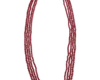1042
Gumps: A 14K Gold, Ruby and Pink Tourmaline Necklace
Featuring four strands of graduated ruby beads finished with a 14k gold and oval pink tourmaline cabochons clasp, signed Gumps
Length: 28 in.
120.1 grams gross
Estimate: $1,500 - $2,500