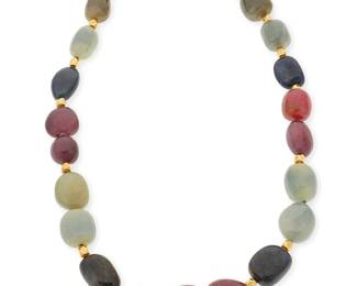 1037
A Gold and Sapphire Bead Necklace
Featuring multi-colored graduated sapphire beads finished with an 18k gold toggle clasp
Length: 20 in.
152.7 grams gross
Estimate: $600 - $800
