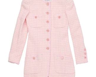 1086
CHANEL: A Vintage Boutique Pink and Cream Cotton Bouclé Jacket
1997, France
Label: Chanel Boutique / Made in France / 97P
Size 34
A 1997 Printemps pale pink and cream plaid tweed cotton-mix bouclé longline jacket with gold-tone and pink CC buttons, four button pockets, and with pale pink silk-mix lining and chain trim to inner hem
Jacket: bust: 16 in.; waist: 14 in.; hips: 18 in.; sleeves: 23.5 in.; length: 29 in.
Estimate: $300 - $500