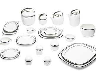 1133
Circa 1996
A Rosenthal porcelain "Suomi" dinner service
Each marked: Rosenthal / studio-linie / Germany
Designed by Timo Sarpaneva with the "Anthracite" black trim decoration, comprising 11 service plates (11.75"), 10 dinner plates (9.75"), 10 salad plates (7.75"), 10 bread plates (6.375"), 10 rim soup bowls (8.375"), 11 cream soup bowls (4.125"), 11 soup bowl saucers (7.125"), 7 fruit/dessert bowls (4.125"), 1 round vegetable bowl (6"), a pair of salt and pepper shakers (2.875"), 1 coffee pot (8.5"), 1 teapot (6.5"), 1 creamer (3.75"), 1 sugar bowl (3.5"), 11 teacups (3.625"), 10 tea cup saucers (6.125"), 1 covered vegetable server with handle (8.25"), 1 covered sauce boat with handle (5.25"), 1 large serving platter (15.25"), 1 medium serving platter (13.25"), 1 large sandwich tray (14"), and 1 relish dish (9.75"), 114 pieces
Estimate: $400 - $600