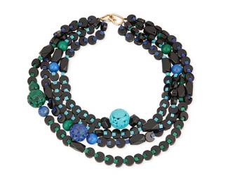 1035
A Gold and Hardstone Necklace
Including four beaded strands including, onyx, glass, lapis lazuli and malachite
Length: 18-22 in.
216.7 grams gross
Estimate: $300 - $500