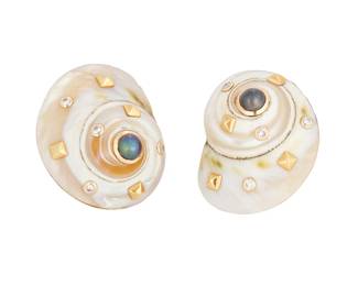 1073
A Pair of 14K Gold and Shell Earrings
Featuring two spiral shells, accent by round diamond and gold pyramid elements finished with peacock cultured pearl centers, no. T8725
2 pieces
Measures: 1 1/4 x 1 1/8 in.
29.3 grams gross
Estimate: $700 - $1,000