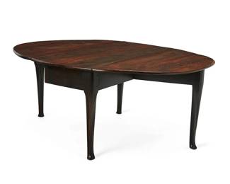 1141
18th century
A Queen Anne oval gate-leg dining table
The mahogany drop-leaf table with dovetail joints and supported on hinged gate legs with slipper feet
Stored: 30" H x 25.5" W x 56.25" D; Extended: 73" W
Estimate: $600 - $800
