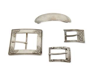 1116
A Group of Silver Accessories
Mid/late 20th century
Each variously marked for maker and for sterling
Comprising an Allen Adler hammered sterling silver hair clip, together with three Mexican silver belt buckles, including La Cucaracha, in various sizes
4 pieces
Clip: 7/8 x 4 1/4 in.; buckles: 2 3/4 x 3 in. to 1 3/8 x 2 in.
165.2 grams
Estimate: $100 - $200