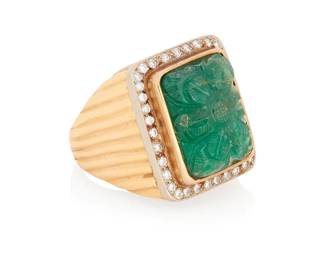 1026
A 14K Gold, Emerald and Diamond Ring
Centering a rectangular carved emerald, encircled by round diamonds
Size: 9 1/4
21.0 grams gross
Estimate: $1,200 - $1,800