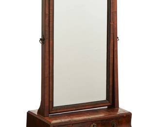 1148
Late 19th/early 20th century
A George II-style tabletop walnut vanity
Appears unmarked
With an oscillating beveled mirror surmounting a single locking drawer with stylized bee and flower cast brass pulls
26" H x 15.5" W x 7.25" D
Estimate: $100 - $200