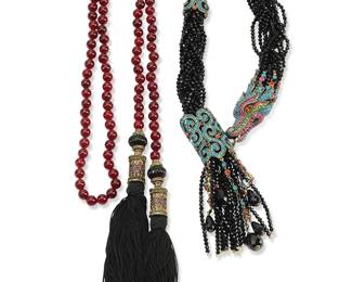 1040
Heidi Daus: Two Vintage Bead and Tassel Necklaces
Featuring a single-strand red bead lariat necklace with rhinestone and silk tassels, as well as a multi-strand black crystal torsade choker necklace with diamanté dragon head and bead tassel to front, one marked for maker
2 pieces
Lengths: 52 in. and 17 1/2 in.
473.2 grams gross
Estimate: $200 - $400
