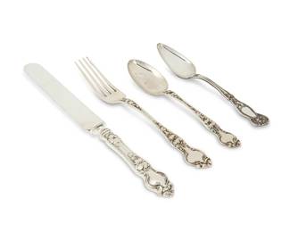 1127
Early/mid-20th century
A Wallace sterling silver "Violet" partial flatware service
Most marked: RW [stag head cipher] & S / Sterling; nine marked: WM Rogers & Son / AA
Designed 1904, comprising 12 dinner forks (7.25"), 12 teaspoons (6"), and 12 dinner knives (8.875"), together with 9 Rogers & Son silver-plated "Orange Blossom" teaspoons (6"), 45 pieces
23.8 oz. troy approximately
Estimate: $500 - $700