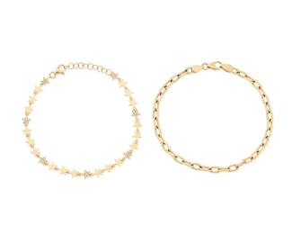 1077
Two 14K Gold and Diamond Bracelets
One including a star design with alternating links set with round diamonds, together with a high polish open link design
2 pieces
Lengths: 7 in.
9.5 grams gross
Estimate: $700 - $1,000