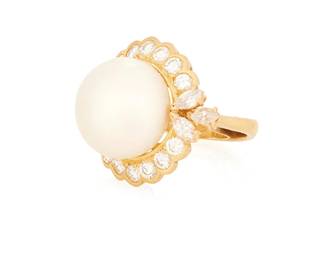 1010
An 18K Gold and Cultured Pearl Ring
Centering a button-shaped cultured pearl measuring approximately 14.3mm, encircled by round and marquise-shaped diamonds weighing approximately 2.30 carats
Size: 4 (with sizing spring)
11.7 grams gross
Estimate: $1,000 - $2,000