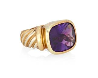 1007
David Yurman: A 14K Gold, Silver and Amethyst Ring
Featuring a mixed-cut amethyst measuring approximately 13.73 x 11.75 x 8.02 mm, signed D. Yurman
Size: 3 3/4
9.4 grams gross
Estimate: $500 - $700