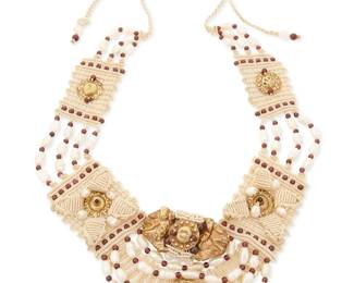 1095
Barbara Natoli Witt: A Cavandoli Macramé and Pearl Necklace
Designed with elaborate beige cord knotwork featuring dimensional floral motifs and 14k gold foil ancient ornament accents with baroque pearls and garnet beads, circa 2011, signed and dated to ceramic bead
32 in. x 3 in.
84.7 grams gross
Estimate: $800 - $1,200