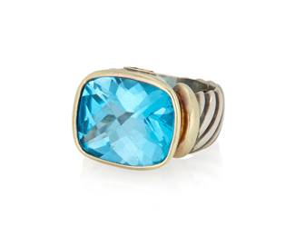 1083
David Yurman: A Silver, 14K Gold and Blue Topaz Ring
Featuring a mixed-cut blue topaz measuring approximately 14.06 x 12.48 x 7.82 mm, signed DY
Size: 4
9.5 grams gross
Estimate: $500 - $700