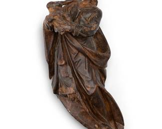 1150
Likely 18th century; Latin America
A Spanish Colonial carved wood santo figure
The carved wood figure, possibly Saint Christopher carrying the infant Christ, depicted with flowing robes
9.25" H x 3.875" W x 2.875" D
Estimate: $200 - $400