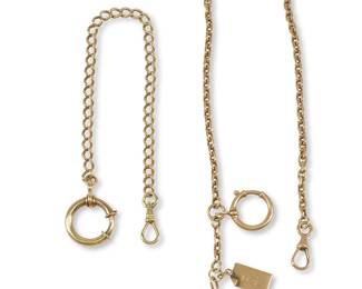 1062
Two Vintage Gold Chain Watch Fobs
Comprising two 14K yellow gold chain watch fobs with clasps, one with monogrammed tag and gold coin charm dating 1899, each variously marked for gold
2 pieces
Lengths: 10 in. and 8 in.
41 grams
Estimate: $2,000 - $2,500