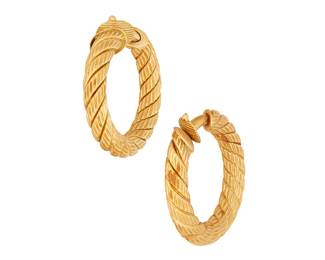 1027
A Pair of Gold Hoops
Of a twisted gold design
2 pieces
Measures: 1 1/4 in.
22.4 grams gross
Estimate: $1,000 - $2,000