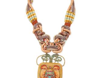 1104
Alex & Lee: A Mixed Metal and Knotted Cord Pendant Necklace
A large resin pendant with bird and wildcat or cheetah motifs and a central multicolored glass diamanté plaque, suspended from wired openwork brass on multiple knotted woven cords in various colors and textures, circa 1970s-1980s, signed verso
23 1/2 in. x 4 1/2 in.
180.0 grams gross
Estimate: $500 - $700