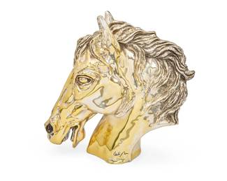 1136
Ricardo del Rio
b. 1961, Mexican
Horsehead sculpture for D'Argenta
Gold-washed silver-plated resin composite and lacquer
Edition: 355/500
Signed in the casting: del Rio; with incised edition; D'Argenta sticker applied to underside
13.5" H x 13.75" W x 5.25" D
Estimate: $400 - $600