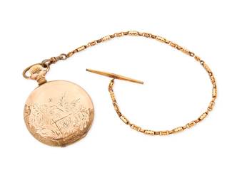 1061
Elgin: A Gold-Filled Pocket Watch
Dial: white with Arabic numerals
Movement: 9837351
Case number: 1923308
Signed: C.D. Peacock
Size: 18s
123.3 grams gross
Estimate: $200 - $300