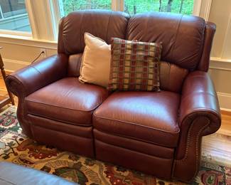 Leather reclining loveseat.