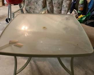 Patio table and two chairs (4 chairs in this set total)
