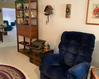 cuckoo clock, lazy boy chairs, wall art and decor, wood chest