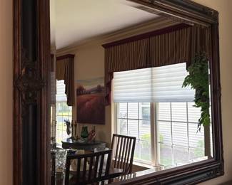 dark wooden frame wall mirror