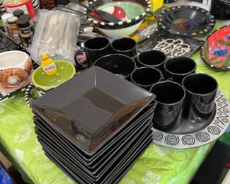 black plates with mugs & misc dishes