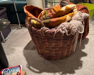 large basket with blankets/throws