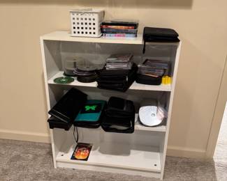 bookcase, CDs, CD carrier, etc