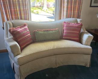 Skirted Curved Loveseat with Pillows