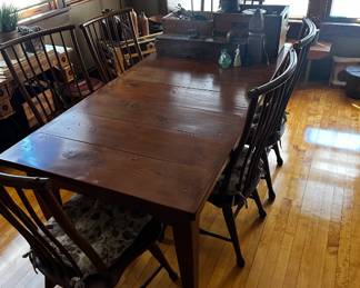 Magnificent dining room table and 6 chair set by Schuler from Janesville, Wisconsin.