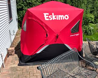 Pull up Eskimo ice fishing shanty.