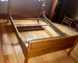 Antique wood bed frame.