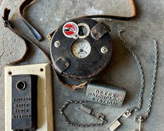 Top - a Detex Guardsman Patrol Night Time Clock. This is a mechanical clock used by security guards to record their rounds. On the left - a Chicago Watch Clock Station. Detex Watchlock Station with attached key on chain, extra Watchlock keys on chains.