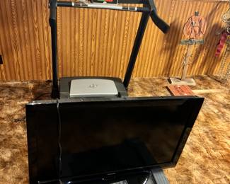 Nordic Track Treadmill and a flat screen TV.
