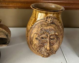 A local renowned Potter did this piece of artwork. Another cool piece.!!