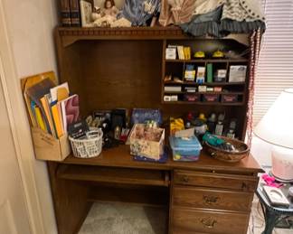 Desk, office supplies, porcelain dolls